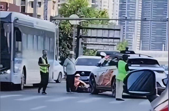 Wuhan Driverless Car Hits Man!